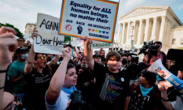 Anti-abortion rights demonstrators protest in front of the U.S. Supreme Court Building on May 03