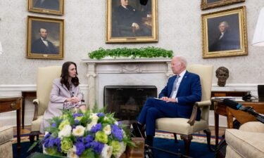US President Joe Biden (R) meets with Prime Minister Jacinda Ardern
