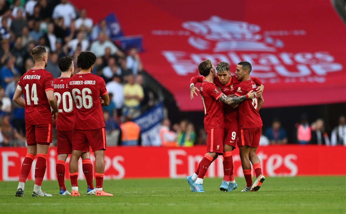<i>Shaun Botterill/Getty Images Europe/Getty Images</i><br/>Liverpool celebrate after Roberto Firmino tucks away his penalty.