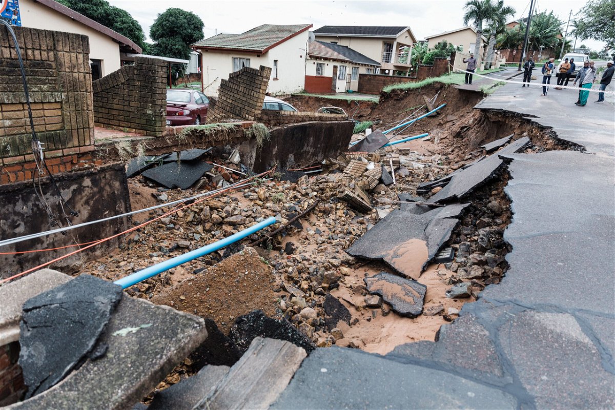 <i>Rajesh Jantilal/AFP/Getty Images</i><br/>A severely damaged home and destroyed road following heavy rains and flooding in Durban