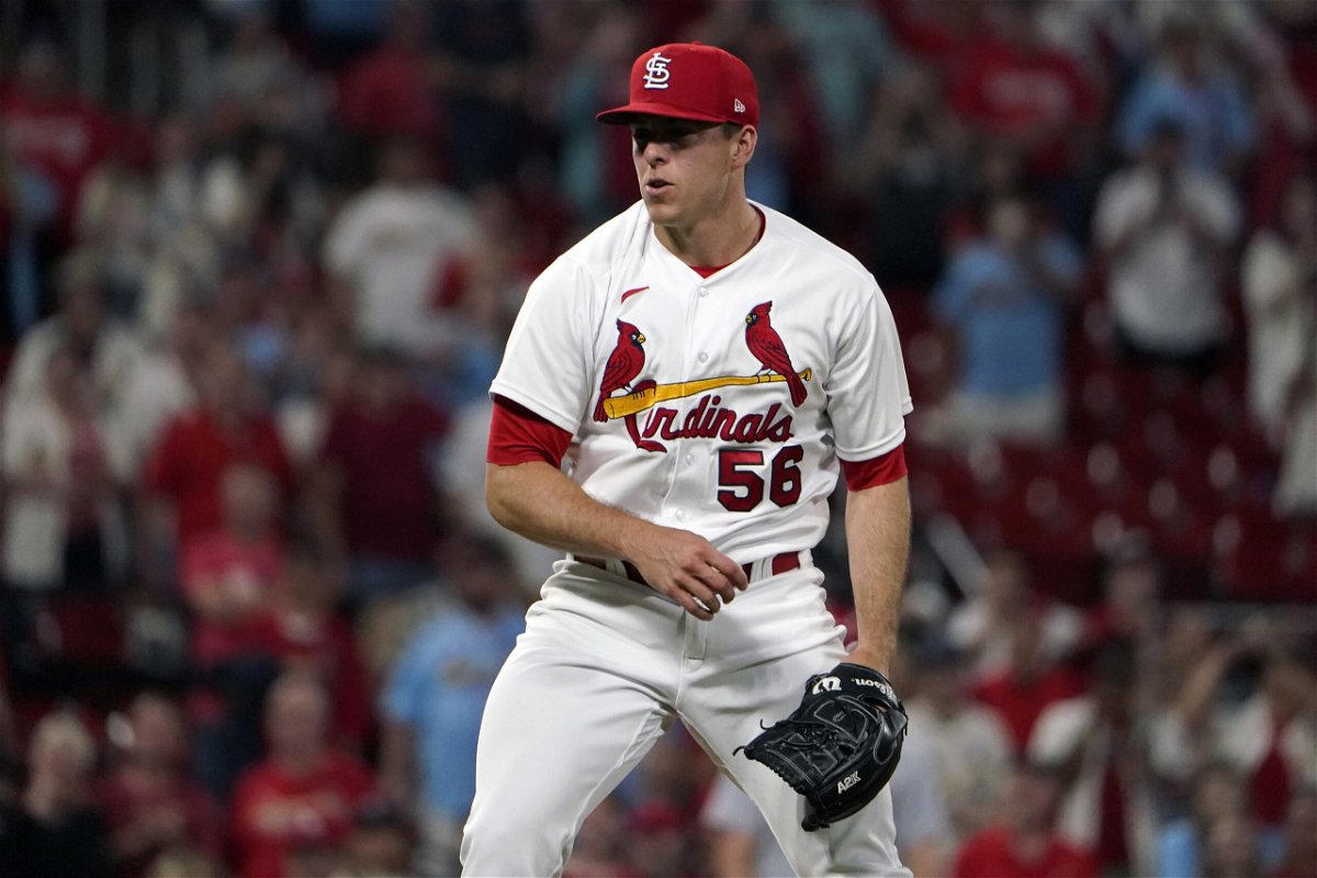 St. Louis Cardinals relief pitcher Ryan Helsley celebrates after striking out Cincinnati Reds' Aristides Aquino for the final out of a baseball game Friday, June 10, 2022, in St. Louis. (AP Photo/Jeff Roberson)