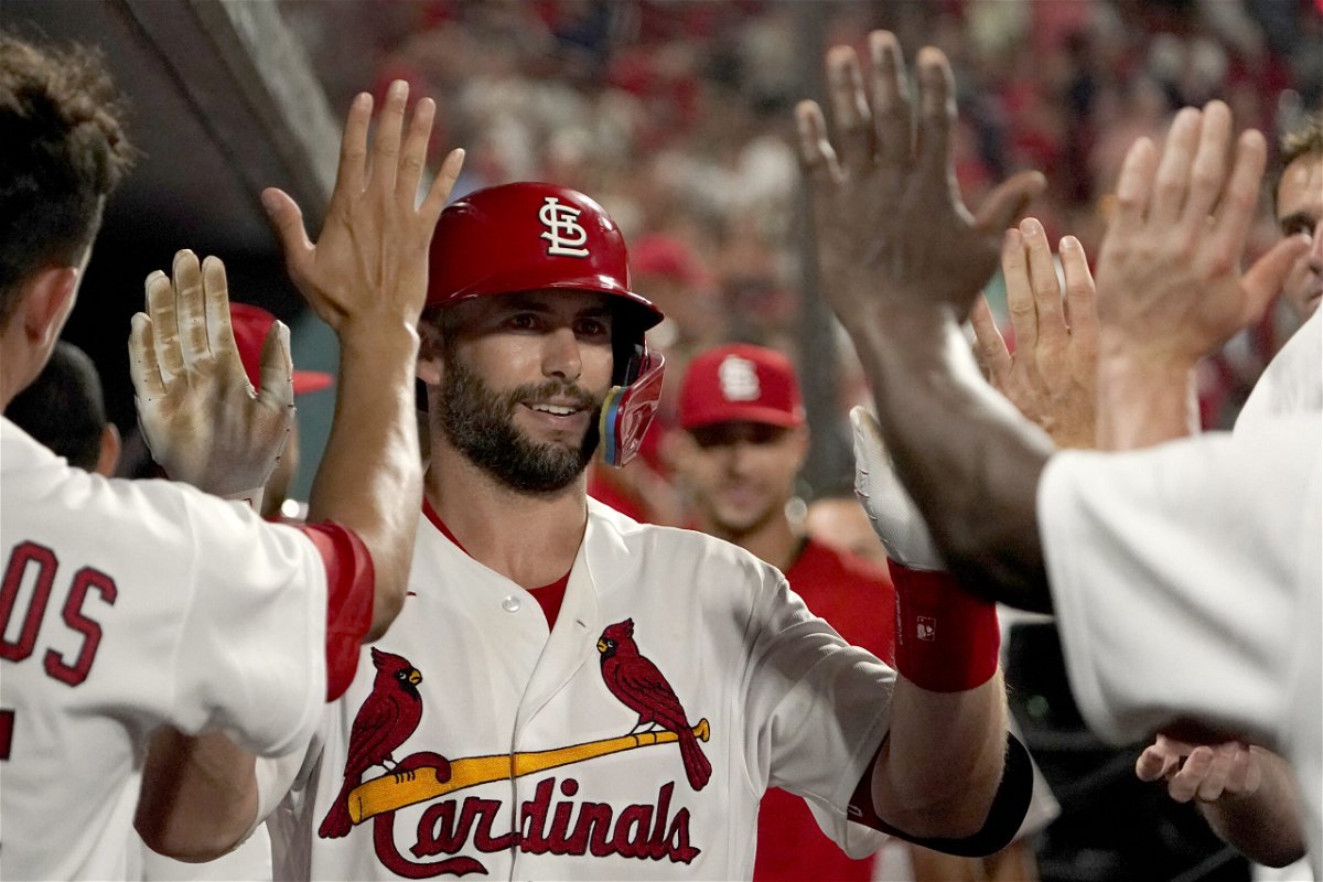 St. Louis Cardinals' Paul Goldschmidt is congratulated by teammates after hitting a solo home run during the seventh inning of a baseball game against the Pittsburgh Pirates Monday, June 13, 2022, in St. Louis. (AP Photo/Jeff Roberson)
