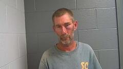 Allan Turner was arrested for allegedly attacking his neighbors and threatening them with a gun.
