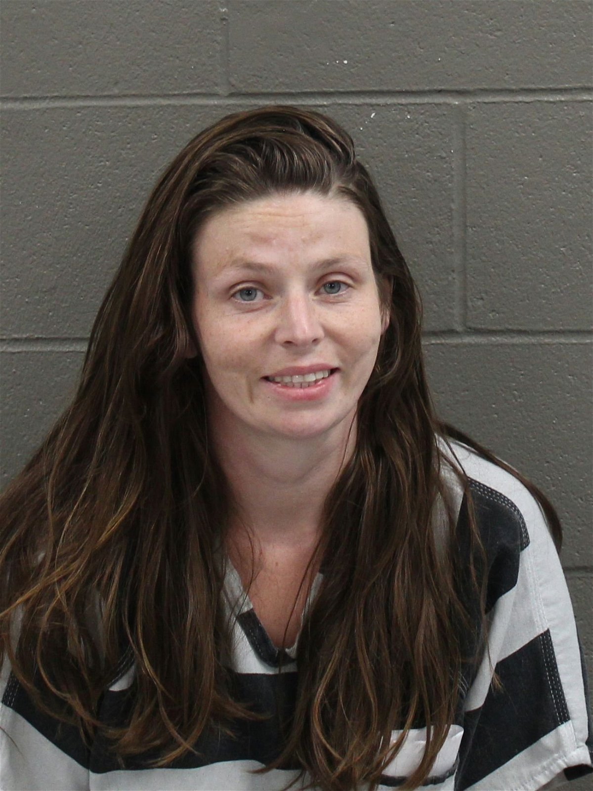 Krista Hardy is charged with first-degree domestic assault - serious physical injury and armed criminal action.