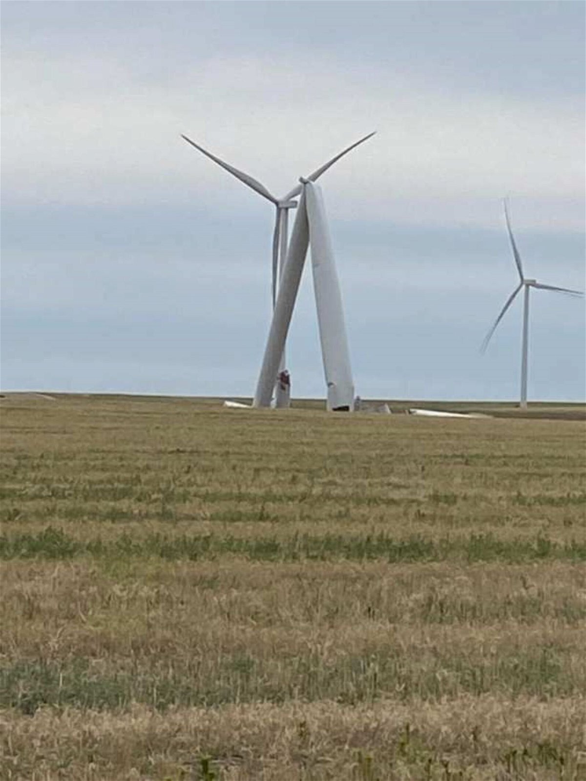 <i>Fleming Volunteer FD/KCNC</i><br/>Fleming Volunteer Fire Department says they received a call Wednesday of blades falling off one turbine. When crews got on scene they found an entire tower had snapped in half and collapsed.