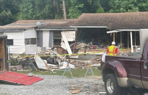 A woman is dead and two others are injured after a teen crashed into their Coweta County home amid a police chase