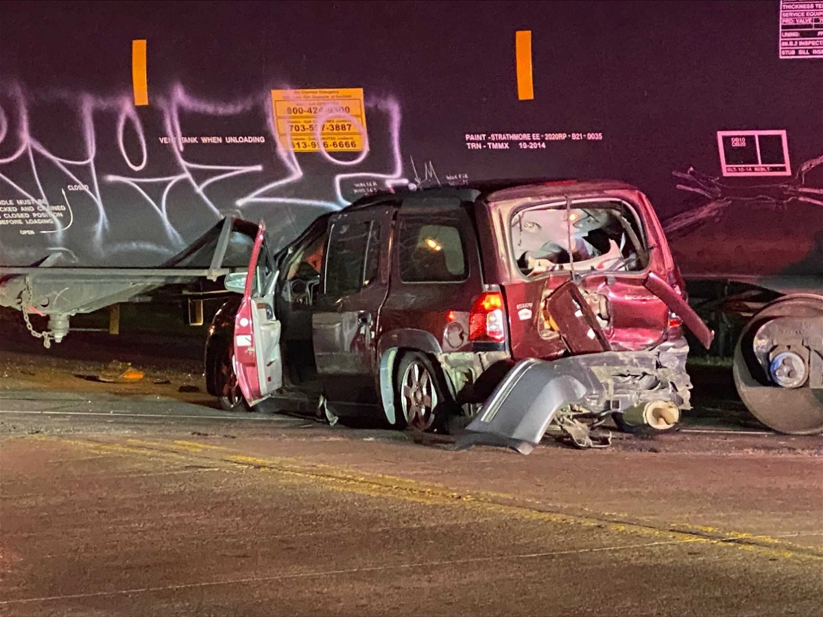 <i>KOCO</i><br/>A collision caused a vehicle to be wedged under a stopped train early Thursday morning in Del City.
