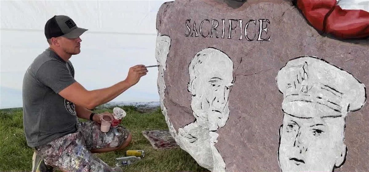<i>KCCI</i><br/>Bubba Sorensen is painting the 100th rock in the Freedom Rock series.