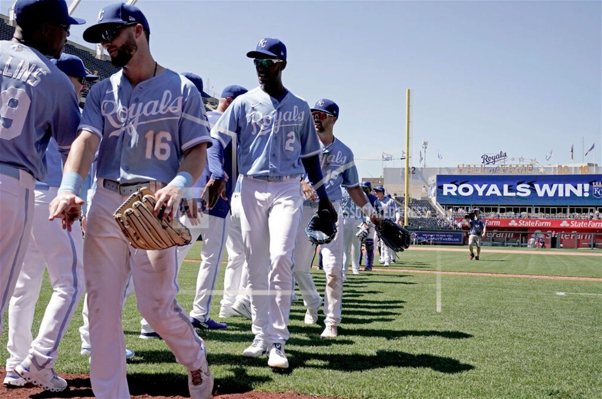 Kansas City Royals celebrate after their baseball game against the Texas Rangers Wednesday, June 29, 2022, in Kansas City, Mo. The Royals won 2-1. (AP Photo/Charlie Riedel)