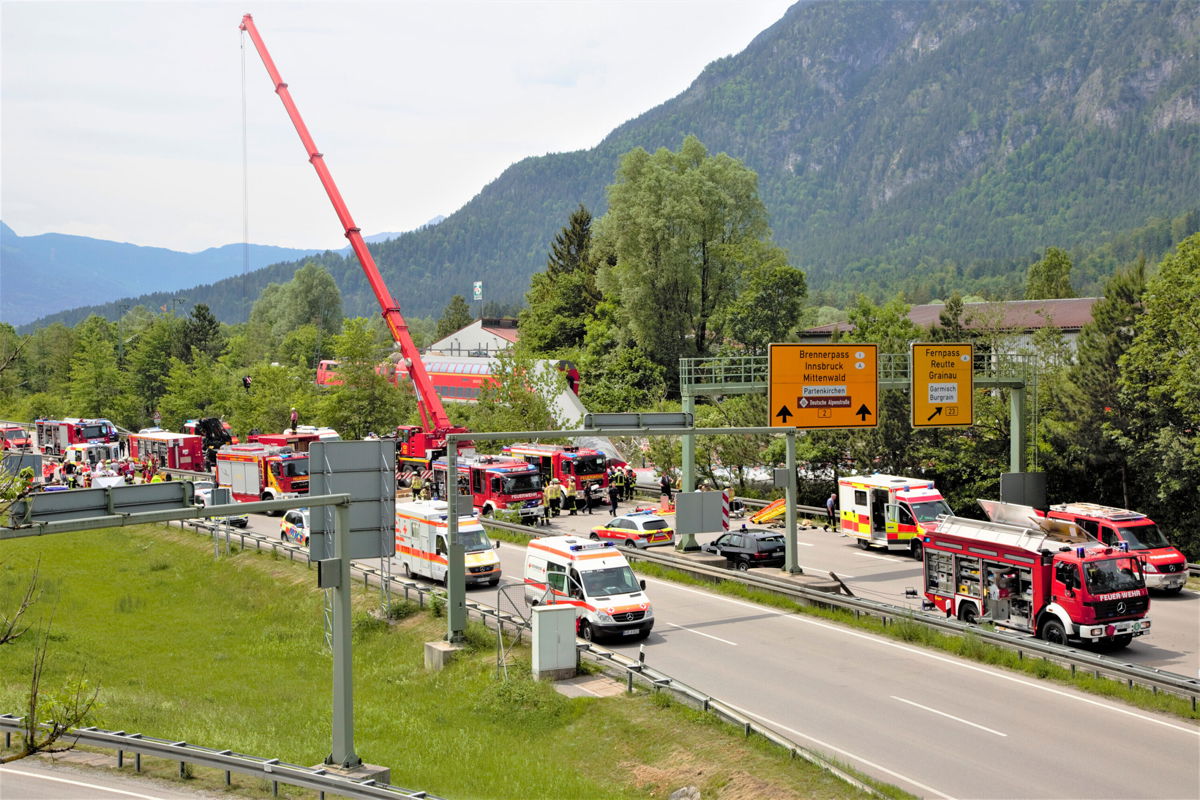 <i>Josef Hornsteiner/AP</i><br/>Emergency and rescue teams at the scene of a train derailment in Garmisch-Partenkirchen