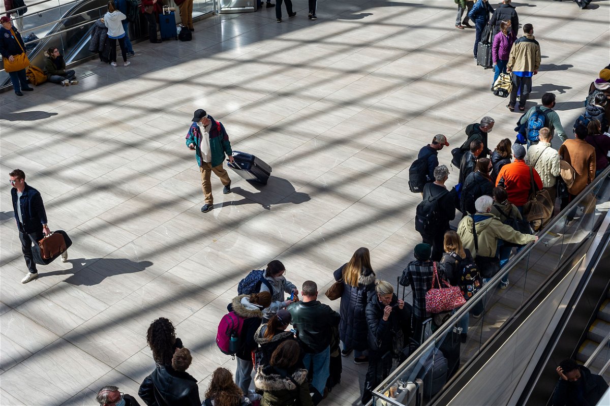 <i>Richard B. Levine/Sipa USA/Reuters</i><br/>Travelers crowd the Moynihan Train Hall in Pennsylvania Station in New York on March 13. The CDC defended its authority to issue a transportation mask mandate in a brief filed on May 31.