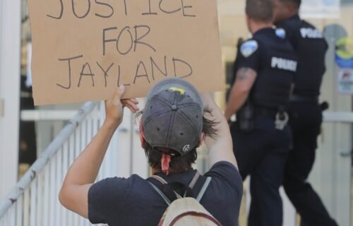 Protestors confront Akron police officers over the shooting death of Jayland Walker on Thursday
