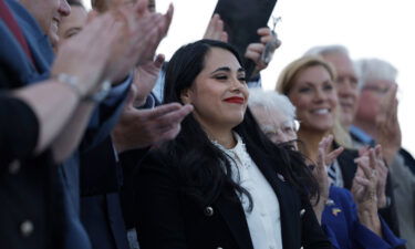 Rep. Mayra Flores is applauded by House Republicans at a news conference after being sworn in at the Capitol on Tuesday