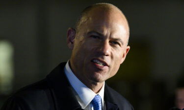 Attorney Michael Avenatti speaks to the press after leaving the federal court house in Manhattan on March 25