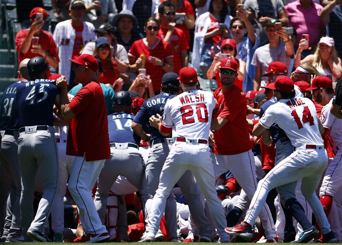 <i>Ronald Martinez/Getty Images North America/Getty Images</i><br/>Major League Baseball has suspended 12 players and coaches following the mass brawl that marred the Los Angeles Angels' win over the Seattle Mariners on June 26.