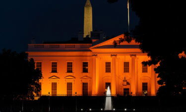 The White House is illuminated with orange lights in honor of National Gun Violence Awareness Day
