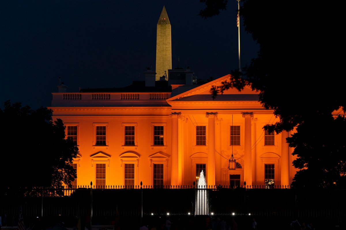 <i>Alex Brandon/AP</i><br/>The White House is illuminated with orange lights in honor of National Gun Violence Awareness Day