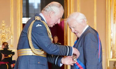 Prince Charles makes David Attenborough a Knight Grand Cross of the Order of St. Michael and St. George in a ceremony at Windsor Castle on June 8.