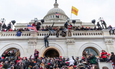 Protesters seen all over Capitol building where pro-Trump supporters riot and breached the Capitol. Rioters broke windows and breached the Capitol building in an attempt to overthrow the results of the 2020 election.