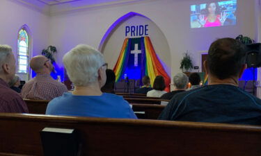 An affirming hymnal is helping LGBTQ Christians keep the faith. Congregants are seen at a Pride service in Augusta