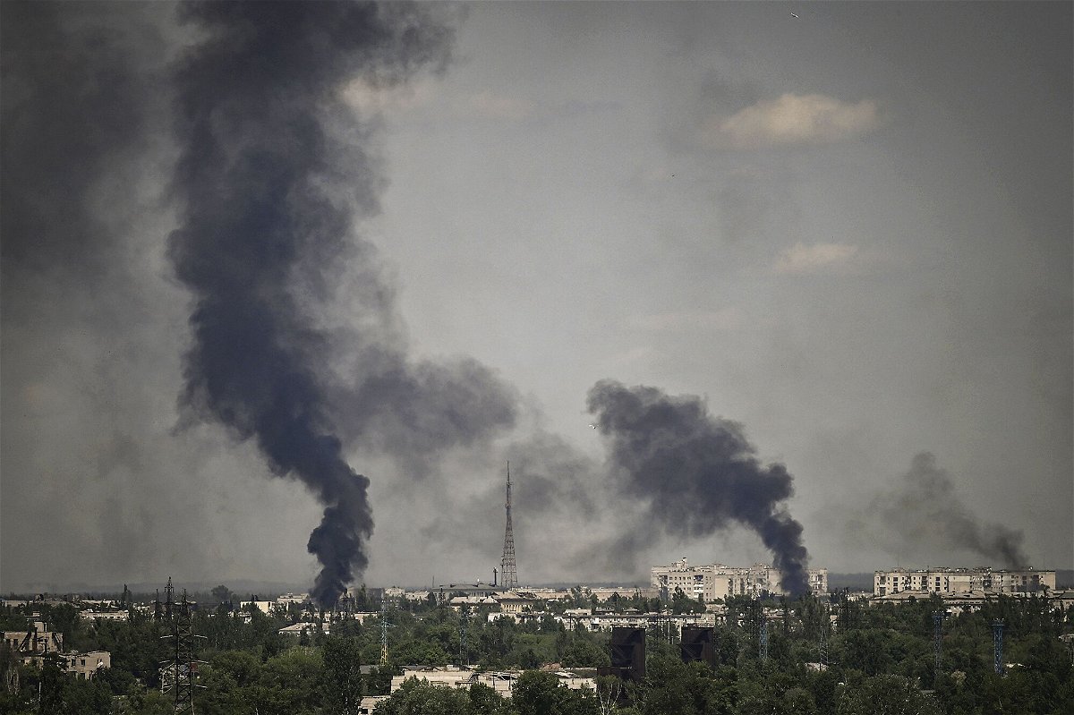 <i>Aris Messinis/AFP/Getty Images</i><br/>Smoke rises in the city of Severodonetsk during heavy fightings between Ukrainian and Russian troops at eastern Ukrainian region of Donbas on May 30