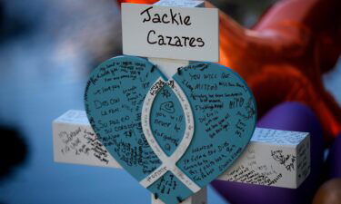 A cross for Jacklyn Cazares stands at a memorial site for the victims killed in the shooting at Robb Elementary School in Uvalde