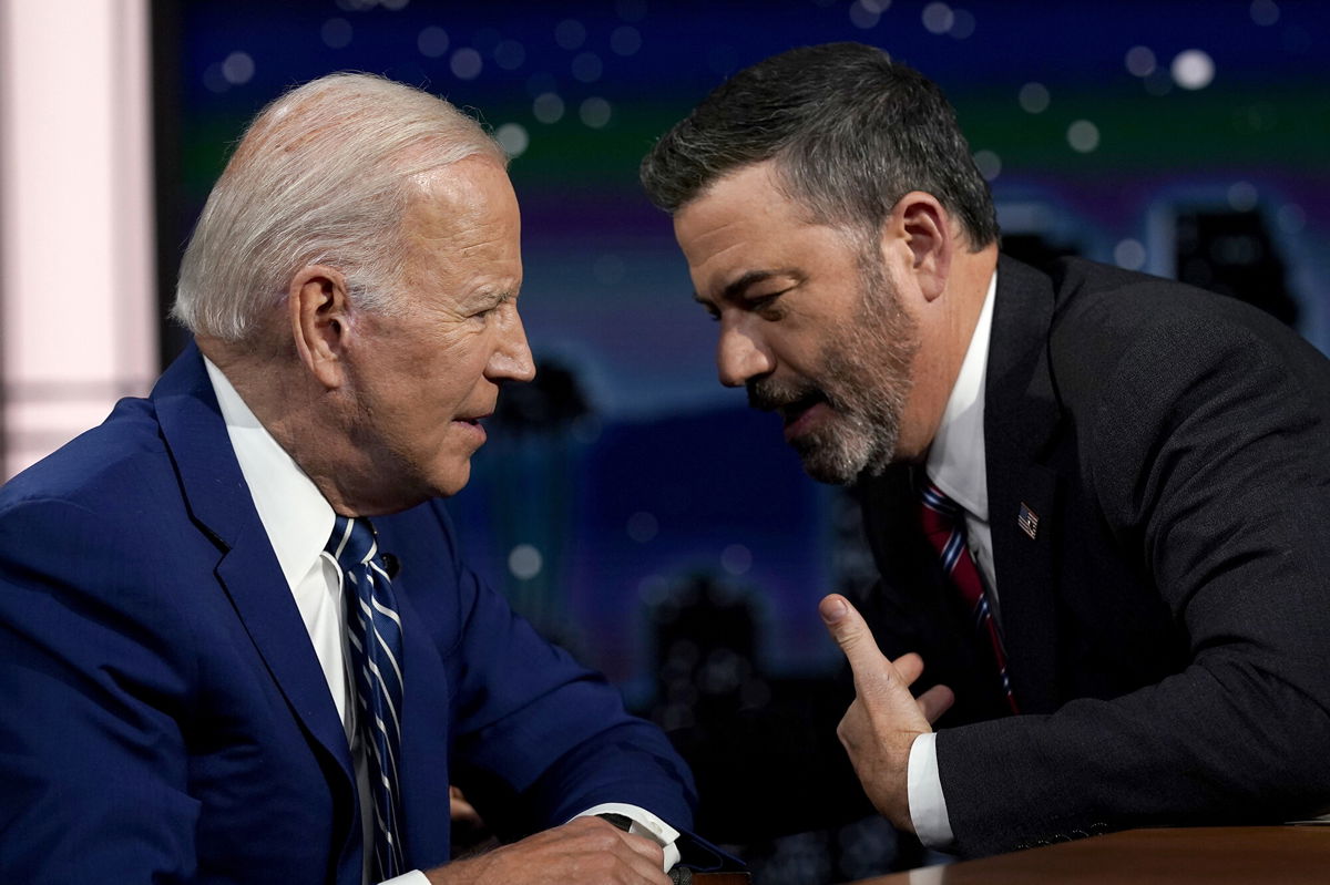 <i>Evan Vucci/AP</i><br/>President Joe Biden speaks with host Jimmy Kimmel during a commercial break during the taping of Jimmy Kimmel Live!