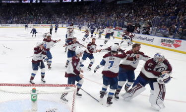 Colorado Avalanche players celebrate after defeating the Tampa Bay Lightning in Game Six of the Stanley Cup Finals.
