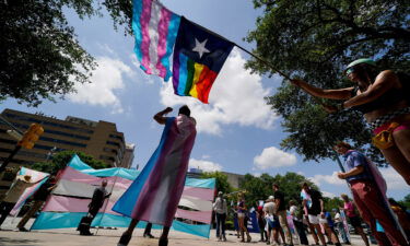 Demonstrators gather on the steps to the State Capitol to speak against transgender-related legislation bills being considered in the Texas Senate and Texas House on May 20