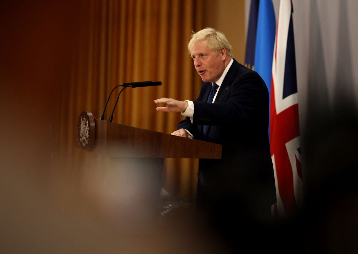 <i>DAN KITWOOD/AFP/POOL/Getty Images</i><br/>Britain's Prime Minister Boris Johnson gestures as he addresses a press conference during the Commonwealth Heads of Government Meeting (CHOGM) at Lemigo Hotel in Kigali on June 24.