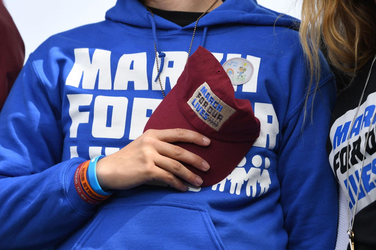 <i>JIM WATSON/AFP/Getty Images</i><br/>Students gather onstage during the March for Our Lives Rally in Washington on March 24