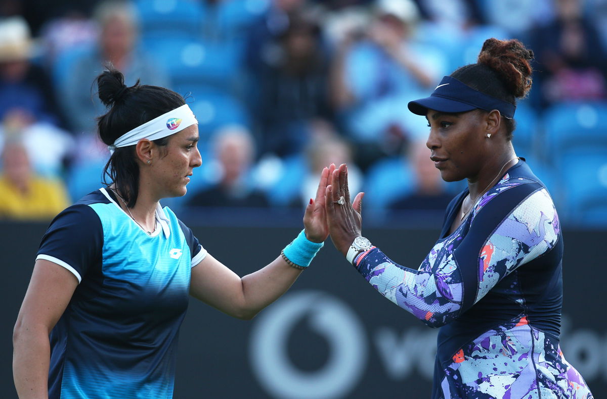 <i>Charlie Crowhurst/Getty Images Europe/Getty Images for LTA</i><br/>Serena Williams and Ons Jabeur won their first round doubles match in Williams' return to tennis.