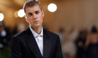 Justin Bieber at the Met Gala in New York City in September 2021. Bieber announced that he is taking a break from performing because he is suffering from paralysis on one side of his face.