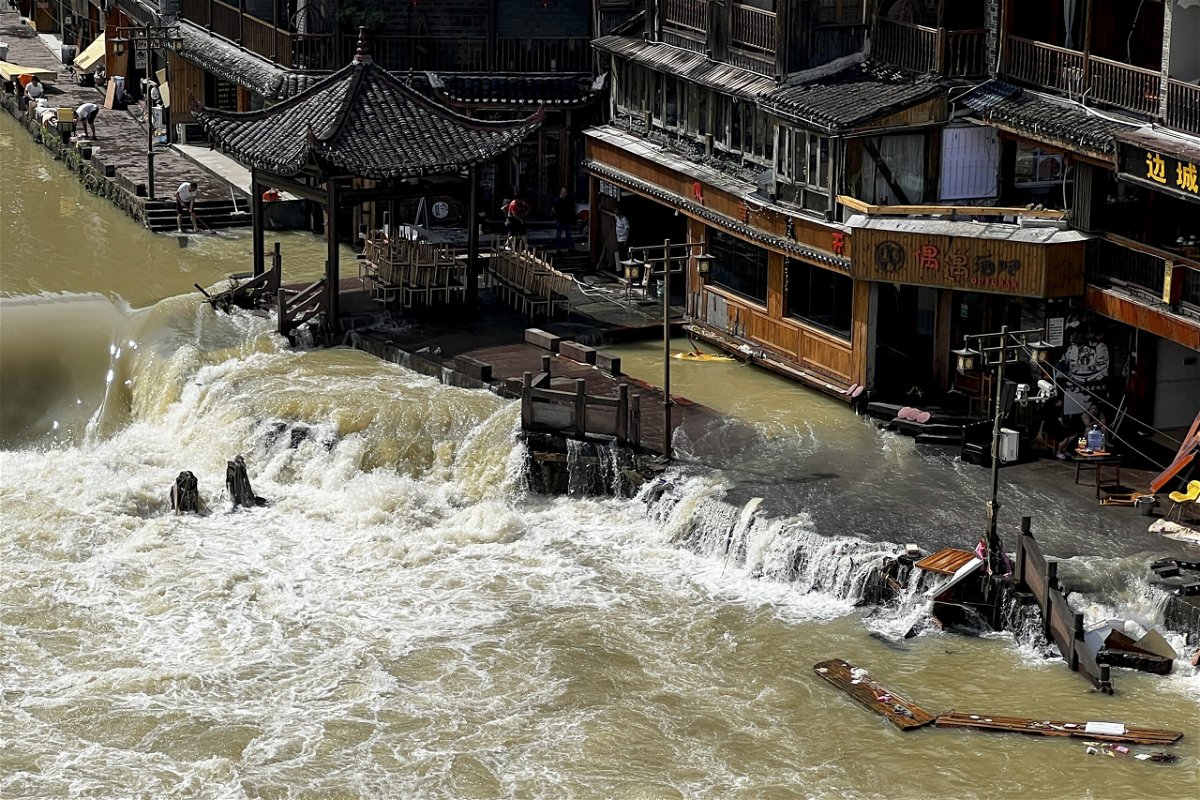 <i>AP</i><br/>Torrential rains in southern China have killed at least 25 people