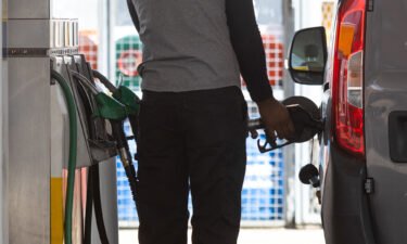 A customer fills their van at a Shell petrol station in London on June 13.
