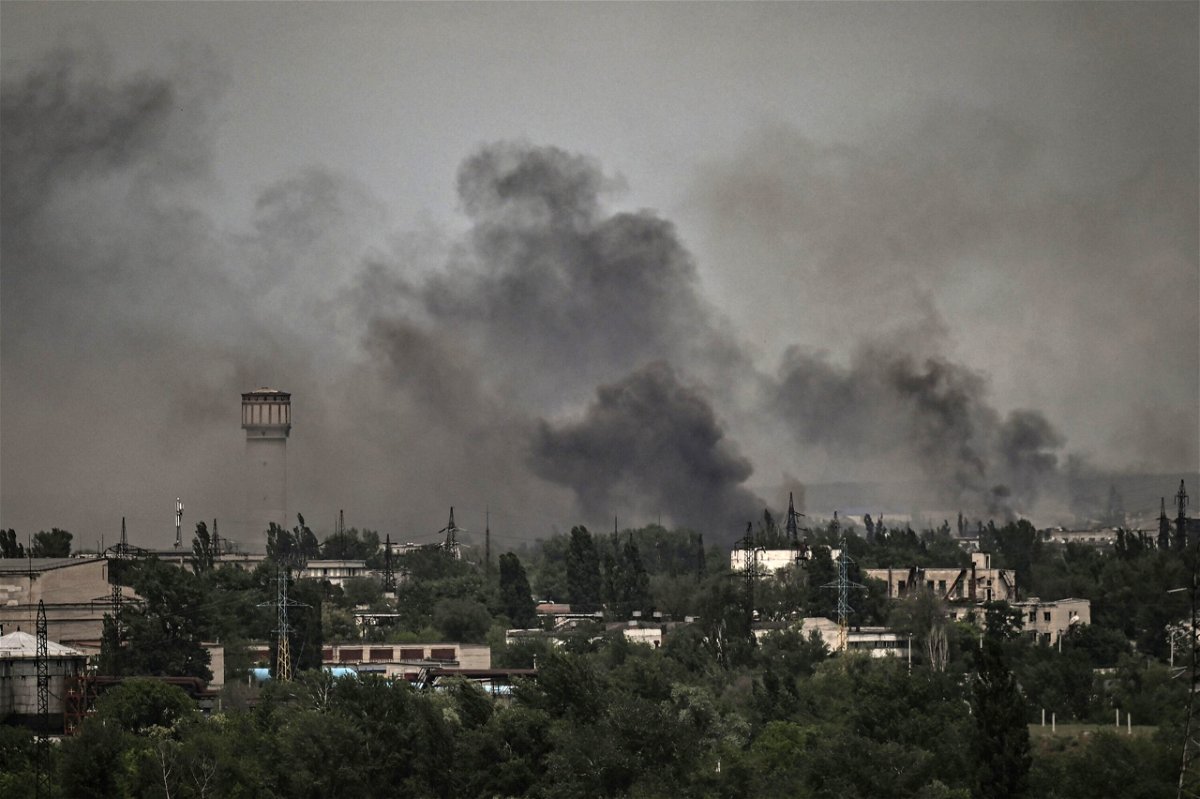 <i>Aris Messinis/AFP/Getty Images</i><br/>Smoke and dirt rise in the city of Severodonetsk during fighting between Ukrainian and Russian troops at the eastern Ukrainian region of Donbas on June 2.