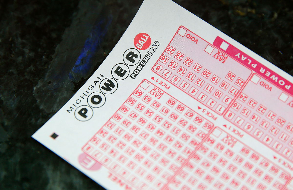 <i>Paul Sancya/AP/FIle</i><br/>A Michigan woman parlayed free lottery tickets into a $100