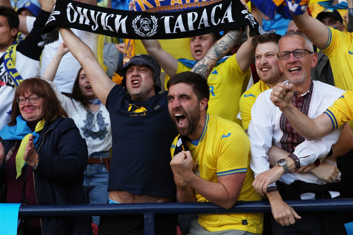 <i>Ian MacNicol/Getty Images</i><br/>Ukraine fans celebrate after Andriy Yarmolenko scored their side's first goal against Scotland.