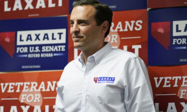 Republican Nevada Senate candidate Adam Laxalt waits to speak at a campaign event Saturday