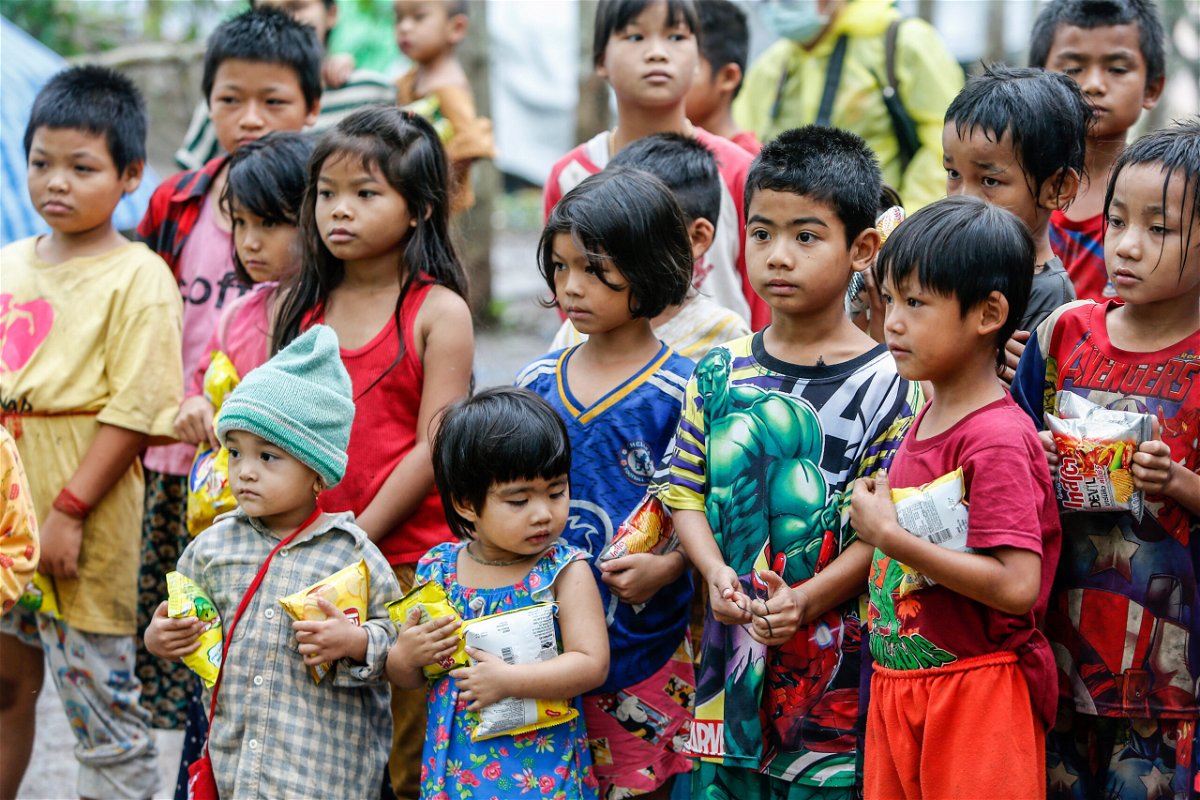 <i>Chaiwat Subprasom/SOPA Images/LightRocket/Getty Images</i><br/>Children stand in a refugee camp along the Thai-Myanmar border.