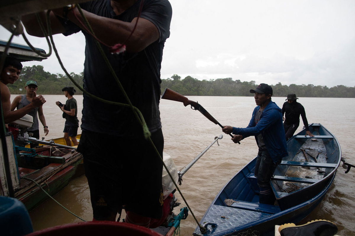 <i>Joao Laet/AFP/Getty Images</i><br/>Indigenous groups search for missing British journalist Dom Phillips and Brazilian Indigenous affairs specialist Bruno Pereira on the Itaquaí River in Brazil's Javari Valley on June 9.