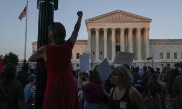 Abortion-rights activists attend a rally after the announcement to the Dobbs v. Jackson Women's Health Organization ruling in front of the US Supreme Court on June 24
