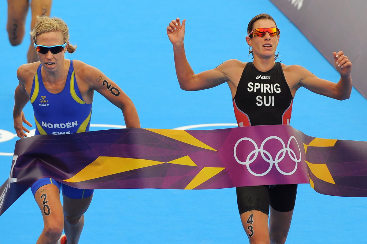 <i>Tim de Waele/Getty Images Europe/Getty Images</i><br/>In perhaps the most dramatic finish triathlon has seen