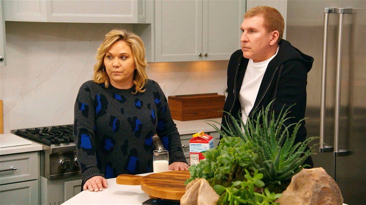<i>USA Network/NBCUniversal/Getty Images</i><br/>Julie Chrisley and Todd Chrisley in a scene from 