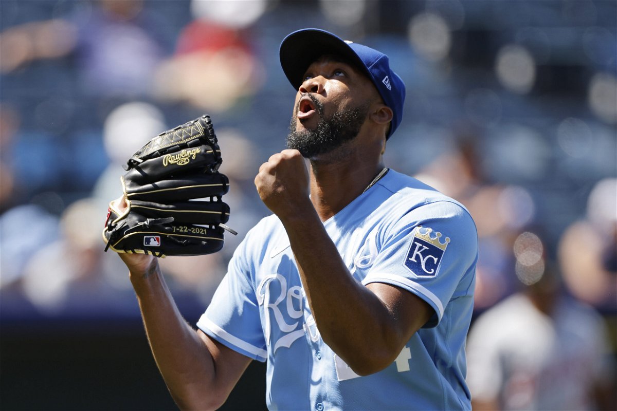 Kansas City Royals relief pitcher Amir Garrett reacts as he walks to the dugout after he is taken out of the game during the seventh inning of a baseball game against the Detroit Tigers in Kansas City, Mo., Wednesday, July 13, 2022. (AP Photo/Colin E. Braley)