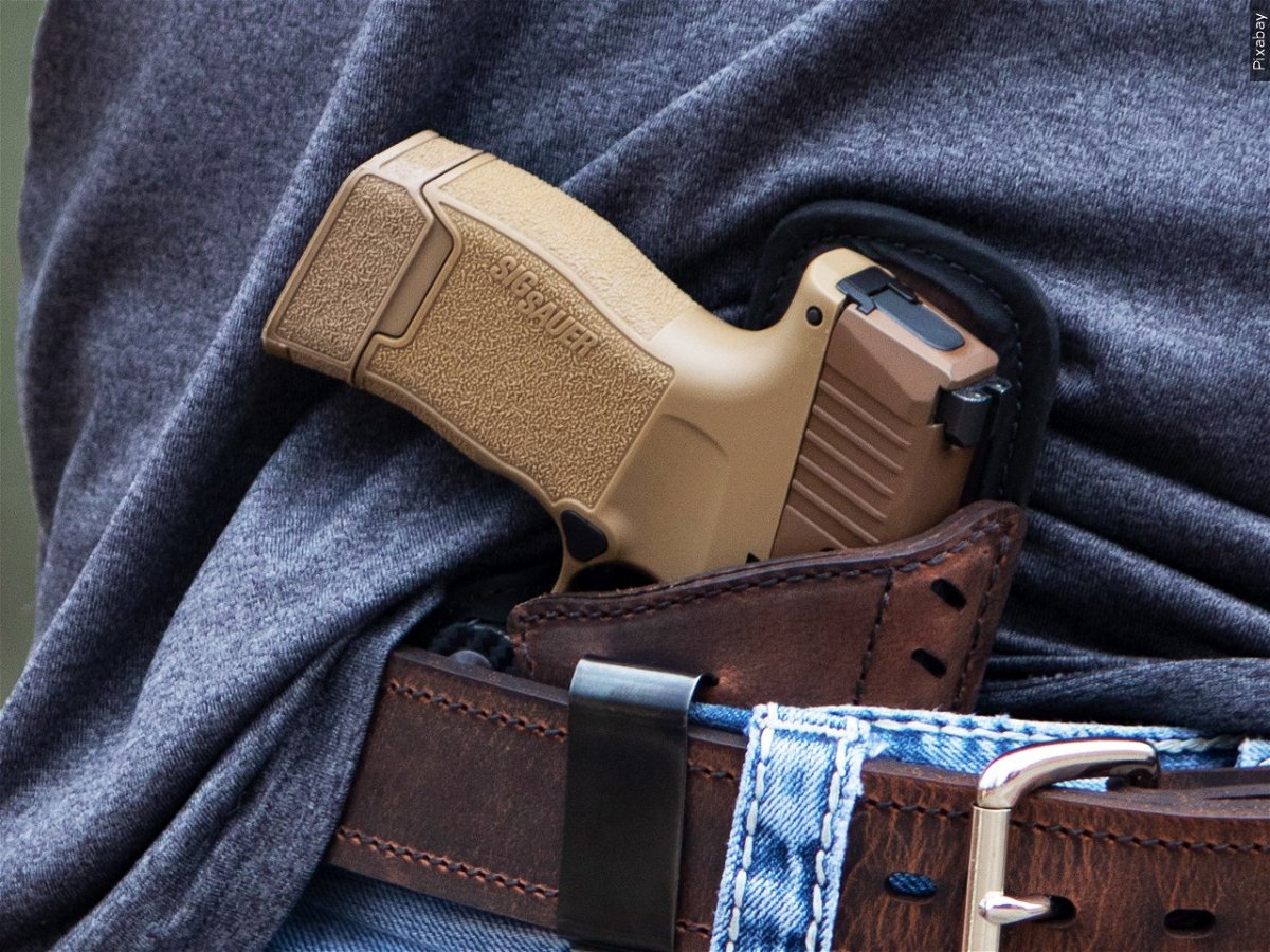 concealed gun in holster, Photo Date: 09/03/2020