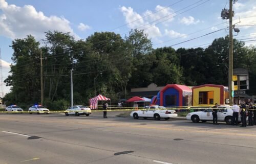 An 8-year-old girl and a 10-year-old boy were injured after being shot in bouncy houses during a Fourth of July cookout