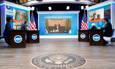 President Joe Biden speaks virtually during a meeting with his economic team in the South Court Auditorium on the White House complex in Washington