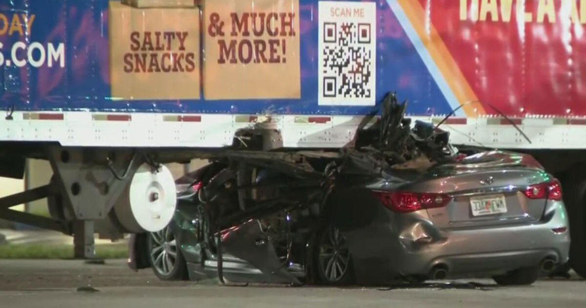 <i>WFOR</i><br/>A car ended up wedged under a tractor-trailer in an overnight crash in northwest Miami-Dade.