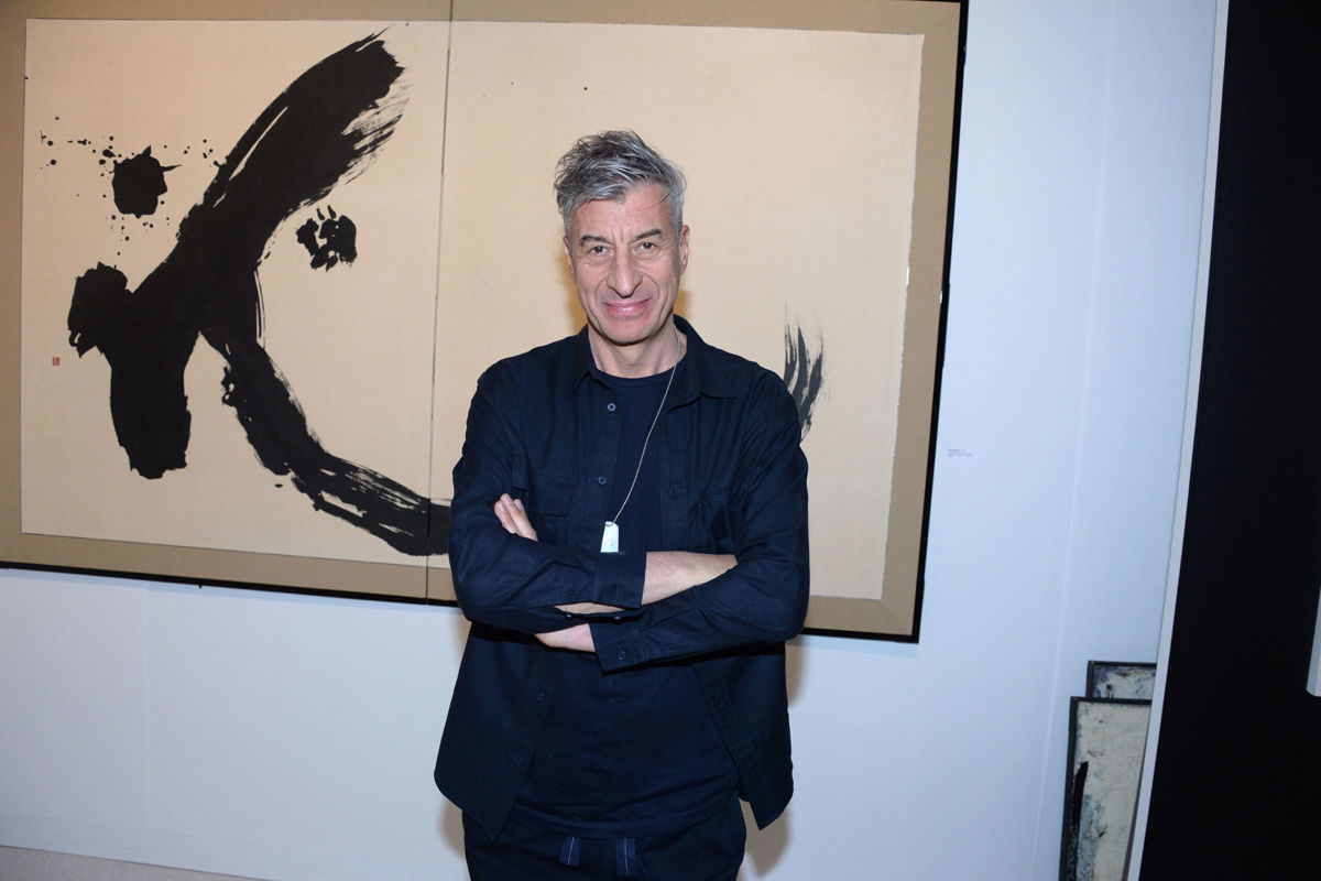 <i>Paul Bruinooge/Patrick McMullan via Getty Images</i><br/>An artist claims Maurizio Cattelan copied his banana artwork. Now the case could be headed to court.